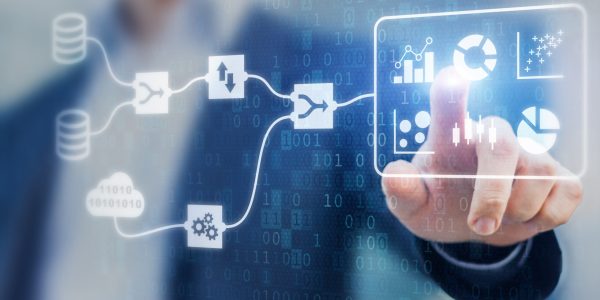 Data Management System (DMS) and Business Analytics concept with servers connected to dashboard to provide information for Key Performance Indicators (KPI), person in background, marketing analysis